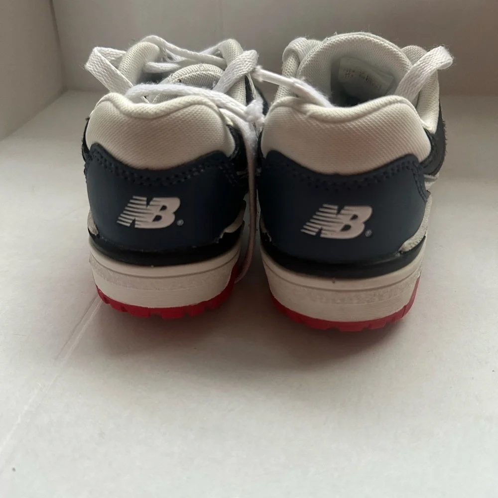New Balance 550 Kids' Sneakers in White, Black, and Red size 12